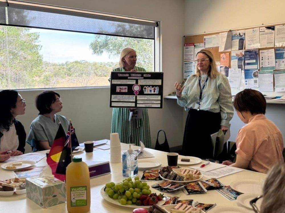 Picture: Receiving a presentation from a PHN representative on women’s health projects at the clinic 